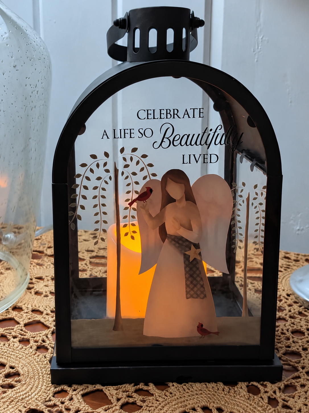 Black memorial lantern with angel, cardinals, and remembrance message